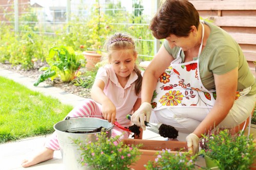 Gardener team preparing tools and safety gear in a garden
